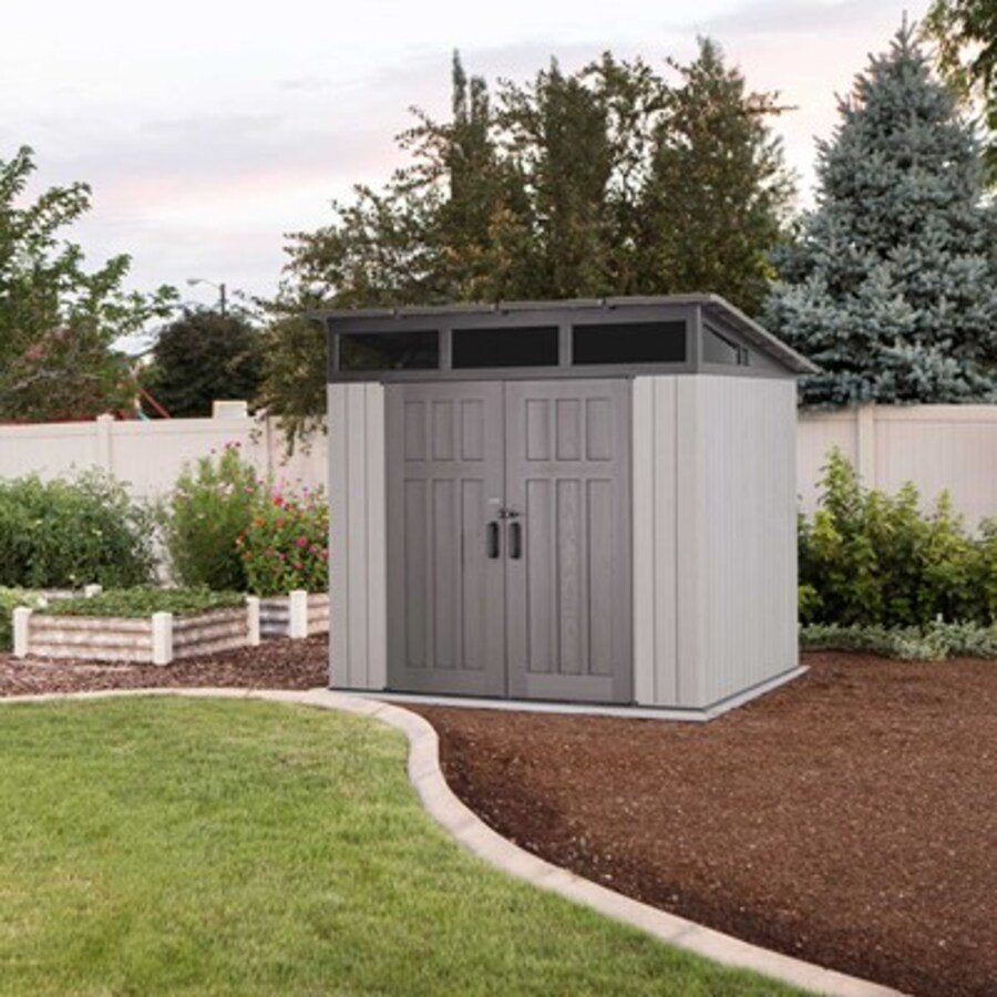 Lifetime Modern Shed installed next to a garden mulch bed, front angle, closed doors.